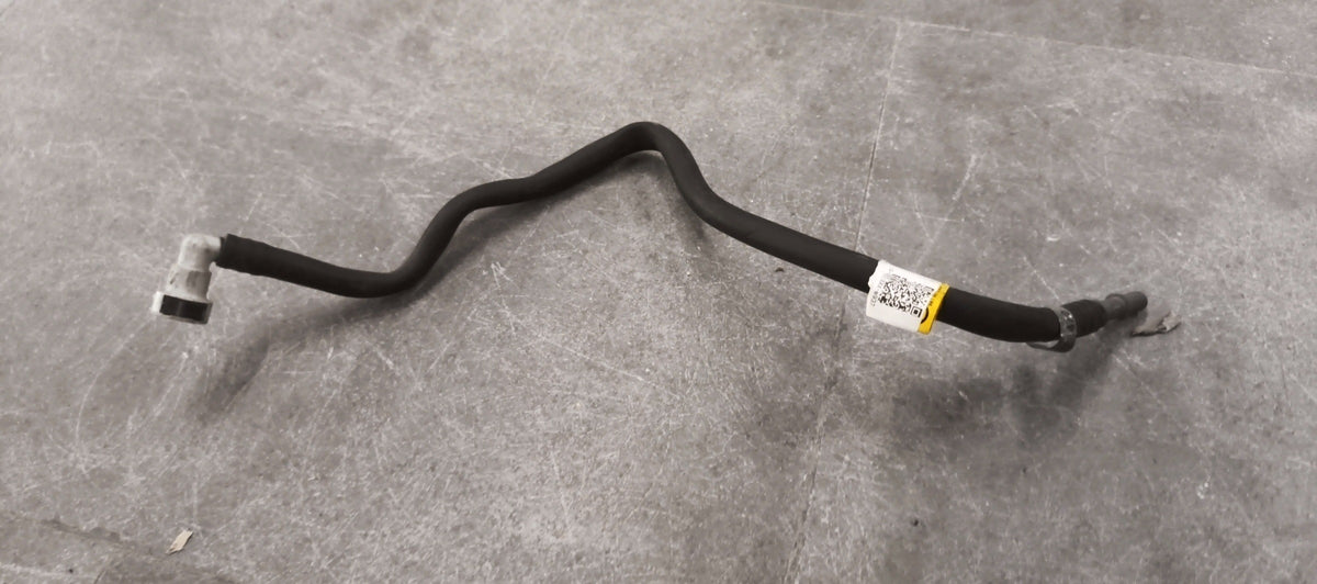General Motors Chevrolet Optra tube fuel filter inlet, close-up image showing the filter component for engine fuel system.