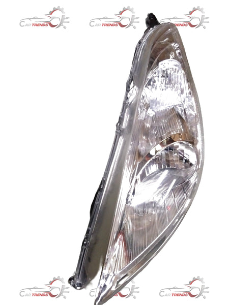 CarTrends Swift 2nd Gen left headlamp assembly showing the clear lens and housing for vehicle lighting.