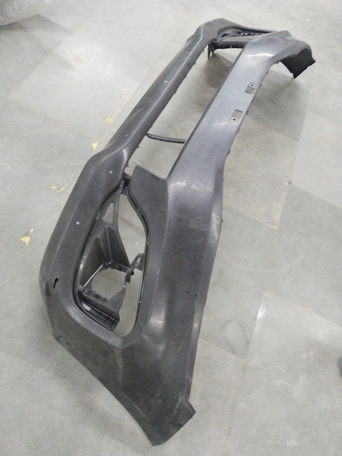 MARUTI SUZUKI Bumper| Front | Ertiga 2nd Gen (2018+) | Petrol / Diesel / CNG | #71711M58R105PK 71711M58R105PK - Left view
