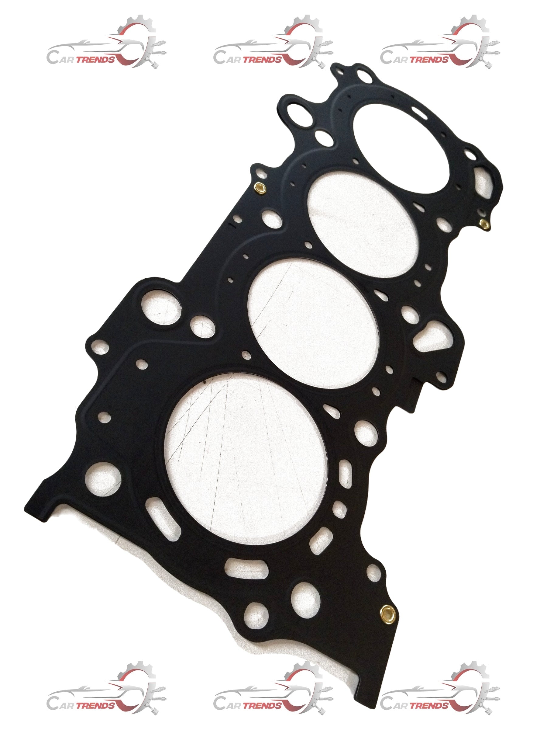 Maruti Suzuki head gasket for Ertiga vehicle, showing a close-up of the gasket's detailed surface and sealing edges