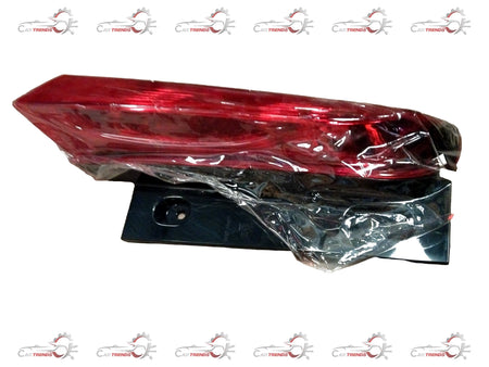 Maruti Suzuki lamp assembly part 35702M72R00, close-up view showing the design and connectors of the vehicle lighting component.