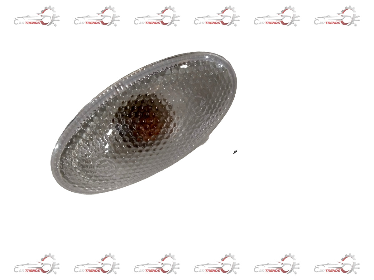 CarTrends indicator part for Ertiga, spare part image showing the small, black plastic component with mounting features.