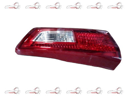 Toyota Hilux rear lamp assembly, left side, showing the rear view with clear lens and mounting details.