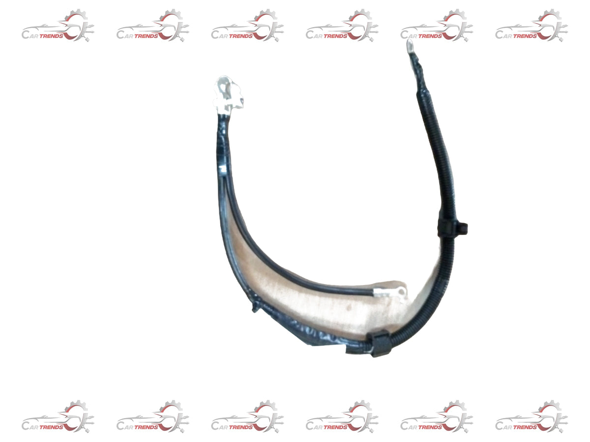 Maruti Suzuki cable battery ground 33850M75L00, automotive grounding cable for vehicle battery connection, close-up view.