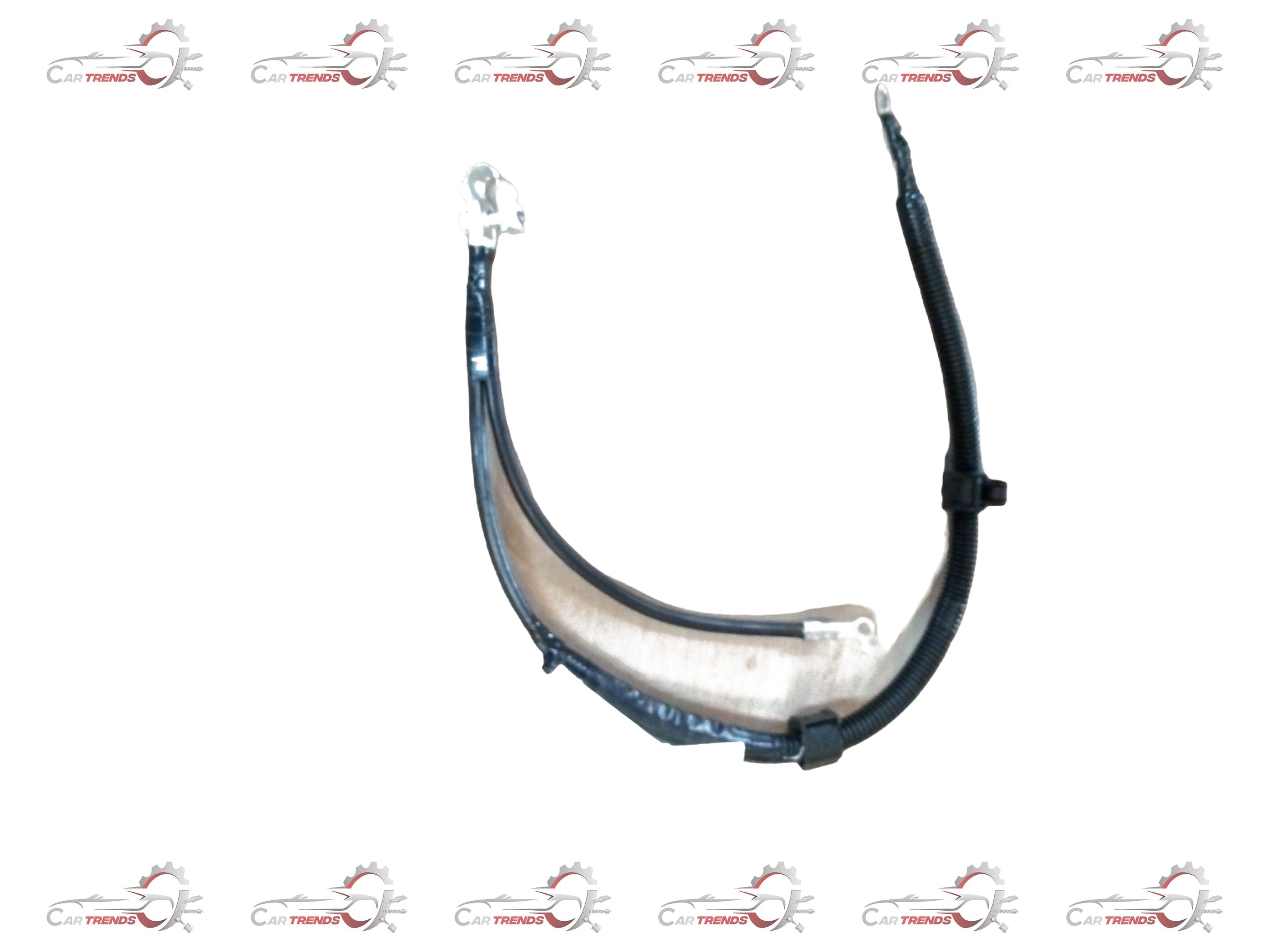 Maruti Suzuki cable battery ground 33850M75L00, automotive grounding cable for vehicle battery connection, close-up view.