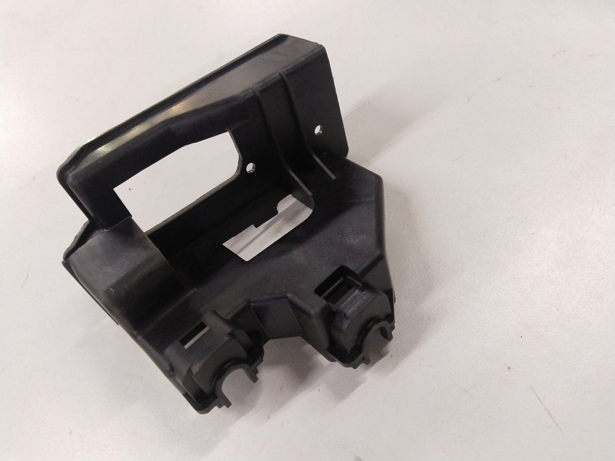 Inside handle of Chevrolet Beat rear RH side door locking rod guide bracket, showing the metal component and mounting area.