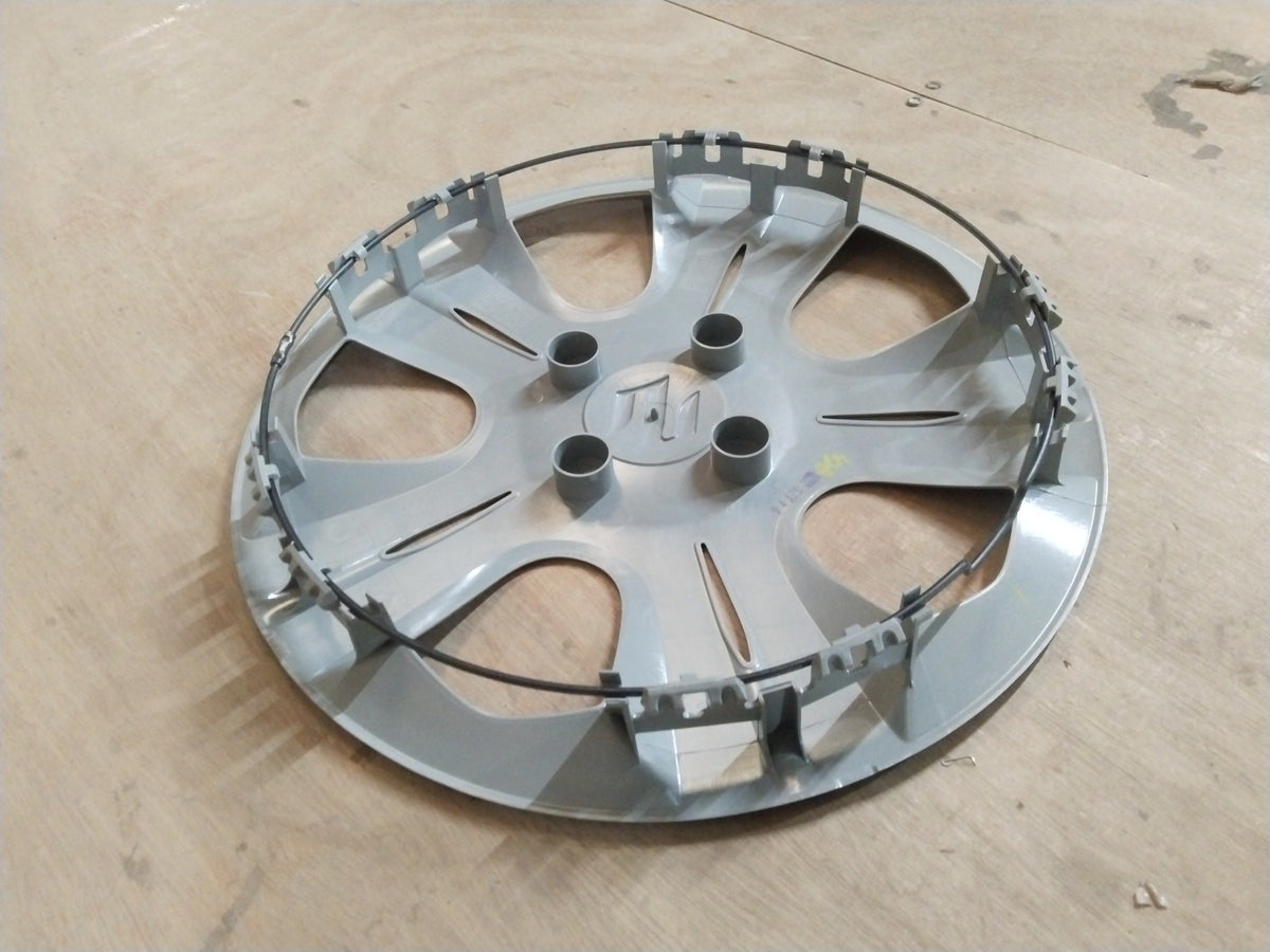 Maruti Suzuki S-Presso machined alloy wheel, close-up of silver finish and detailed design on a car wheel.