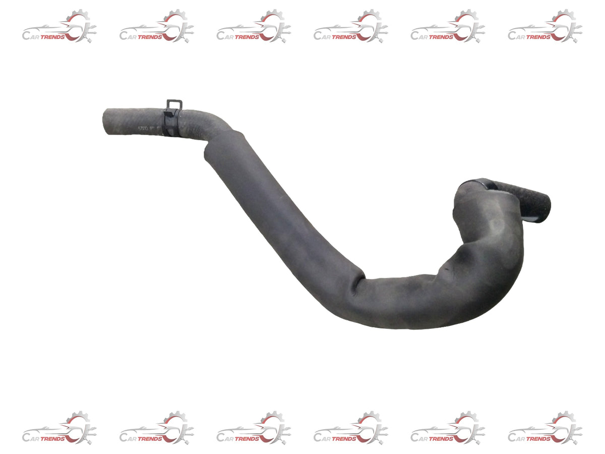 General Motors Chevrolet Aveo hose heater feeding engine component, showing the part installed in a vehicle engine bay.