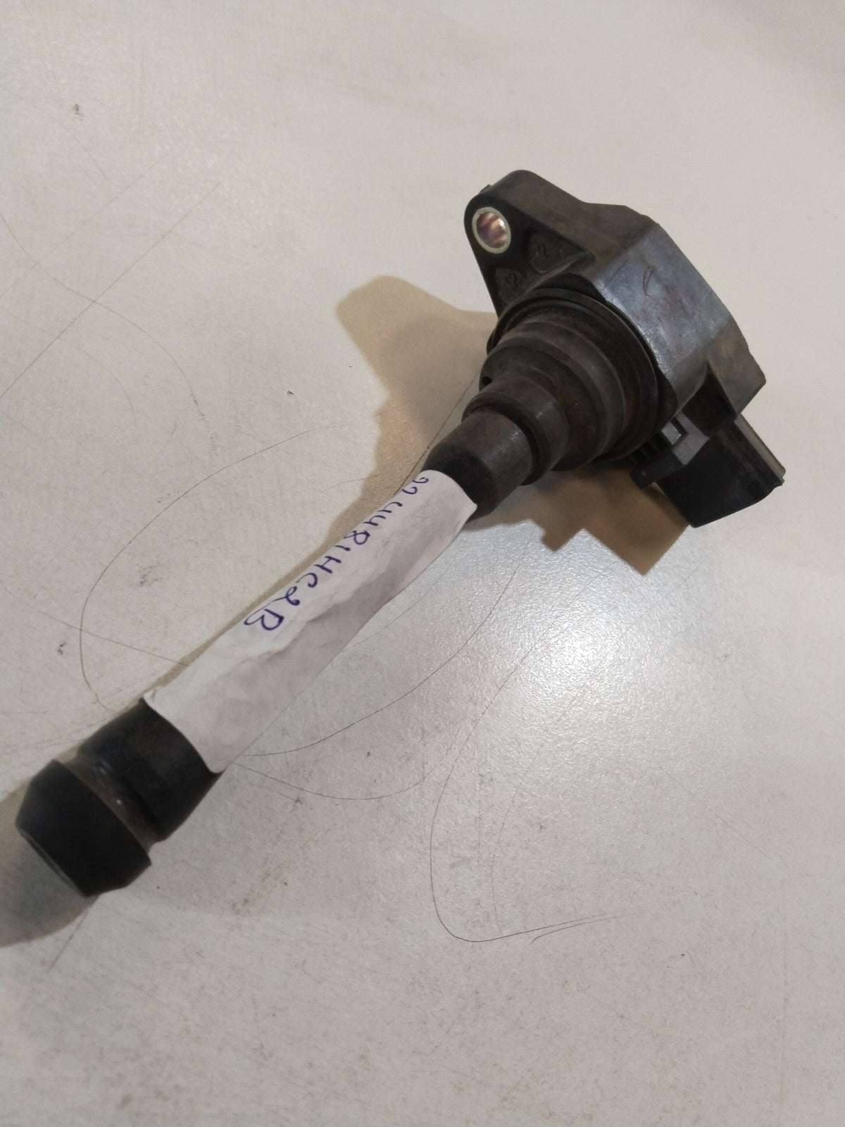 CarTrends ignition coil assembly for Nissan Micra and Sunny, showing the coil with electrical connectors and mounting features.