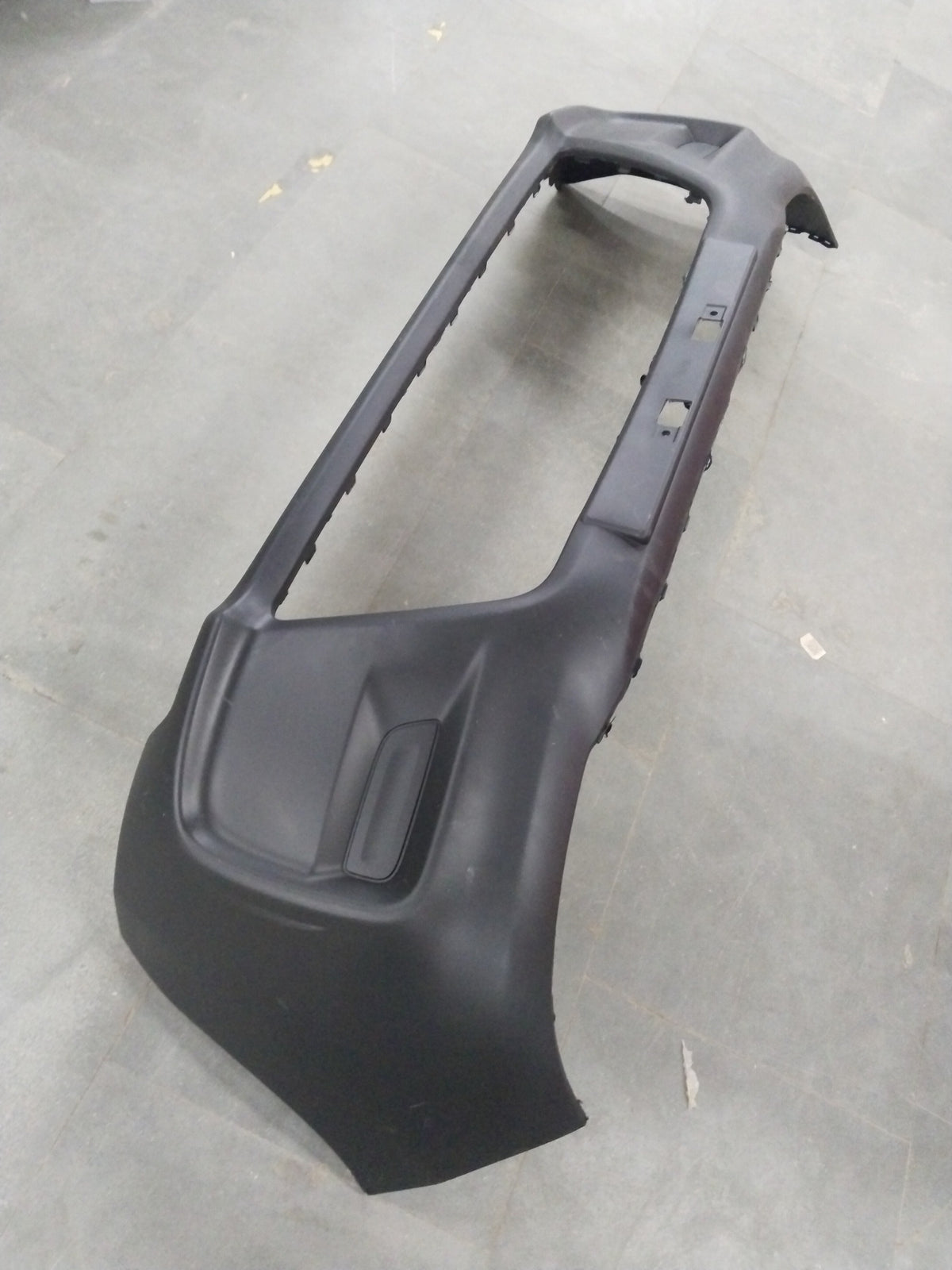 Maruti Suzuki Alto 800 front bumper in petrol/CNG model, showing the black plastic bumper with mounting points.