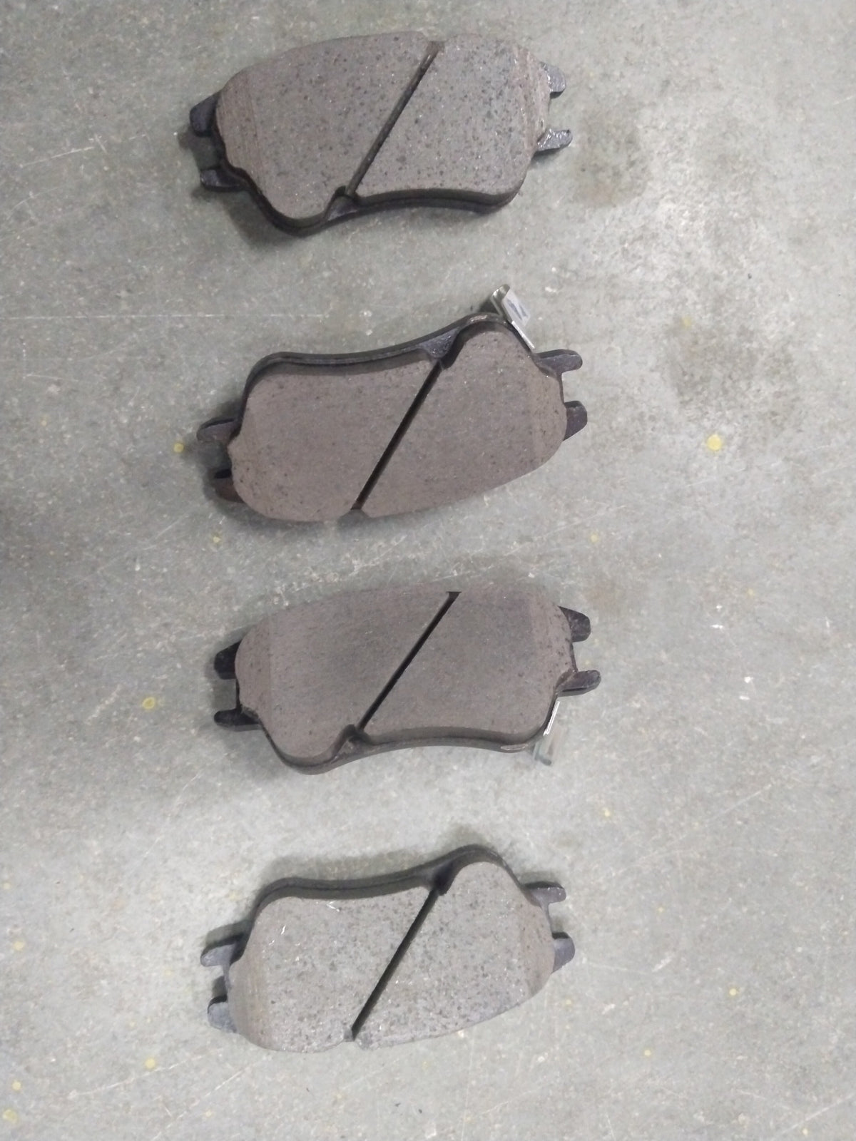 Front HI-Q brake pad for Hyundai Santro Xing, showing the two-piece brake pad set with metal backing plates.