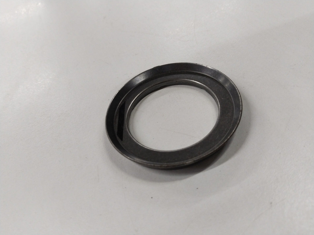 General Motors thrust input sun gear bearing for Chevrolet Cruze, showing the gear’s detailed metal teeth and internal components.
