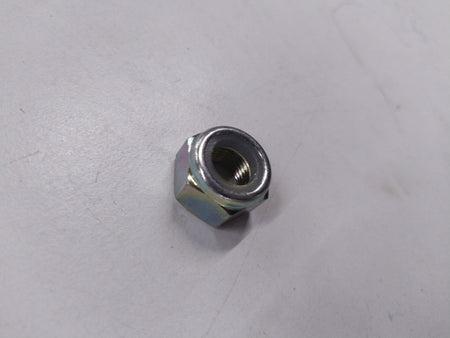 CarTrends Chevrolet Aveo spare nut part, showing a close-up of the metal nut used in vehicle assembly.