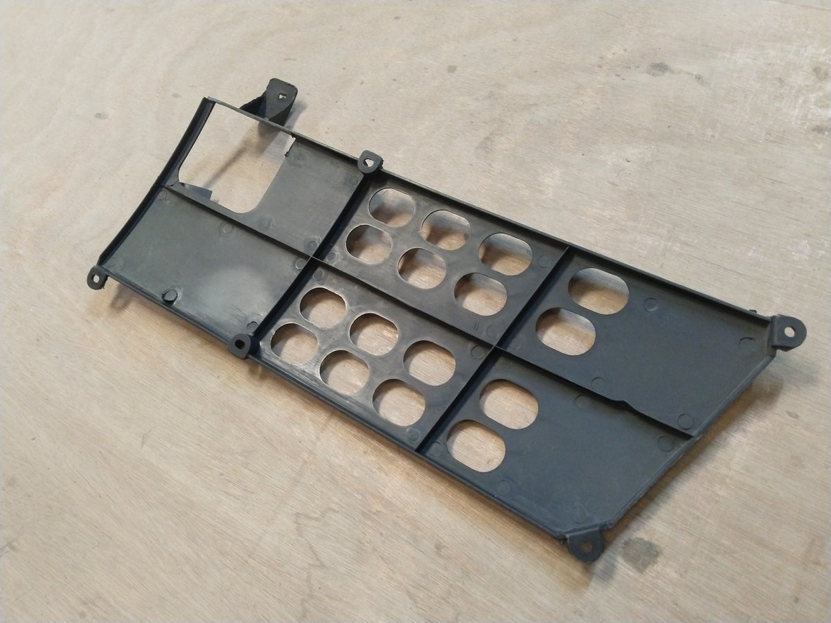 Maruti Suzuki SX4 grille bumper with chrome accents, showing front view with mounting details and vehicle emblem area.