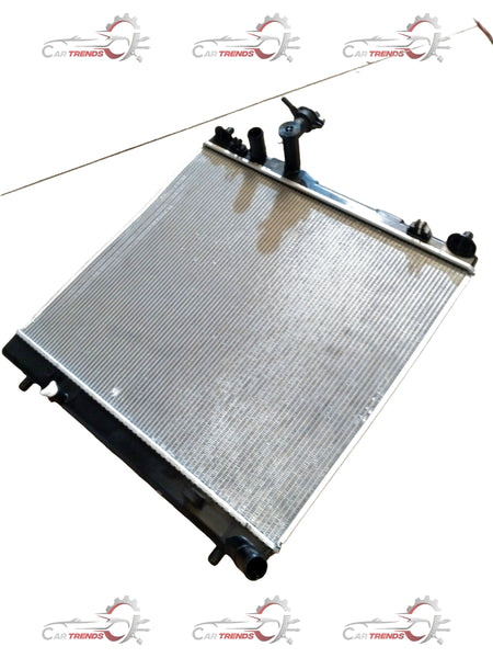 CarTrends Brezza 2nd Gen radiator for 2022+ petrol and CNG models, showing the metal core and mounting brackets.
