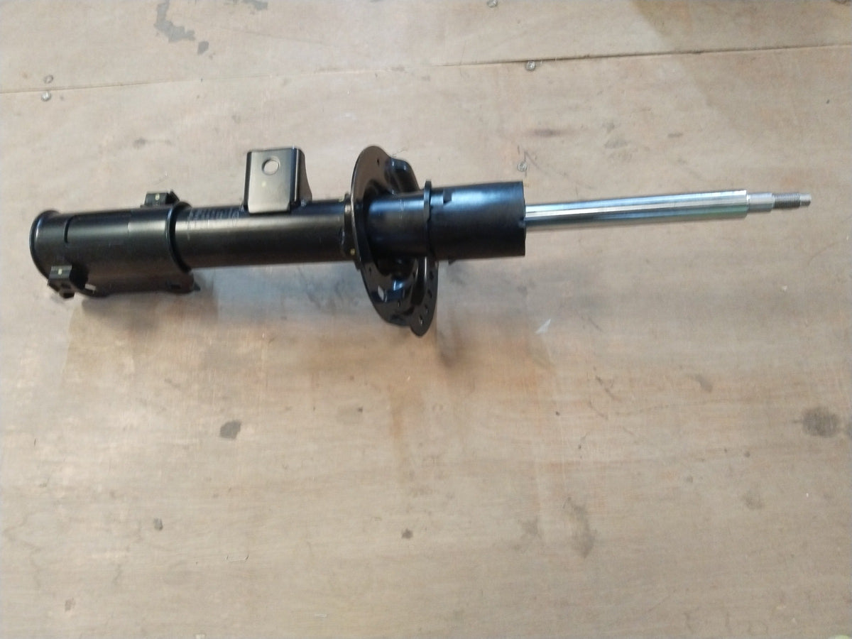 Hyundai Creta front left shock absorber, part #54651A0100, black metal component with mounting points visible.