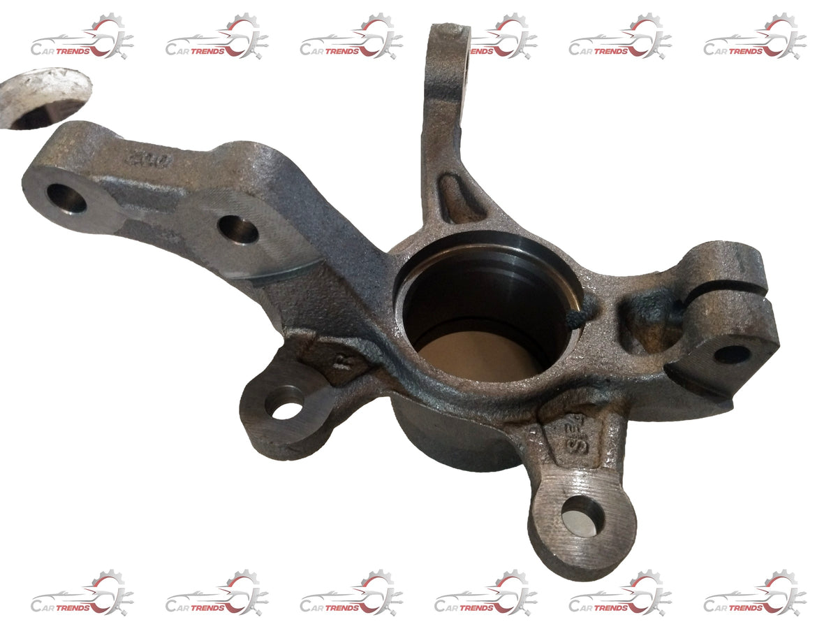 Renault knuckle spindle part by CarTrends, showing the metal component with bolt holes for vehicle suspension repair.