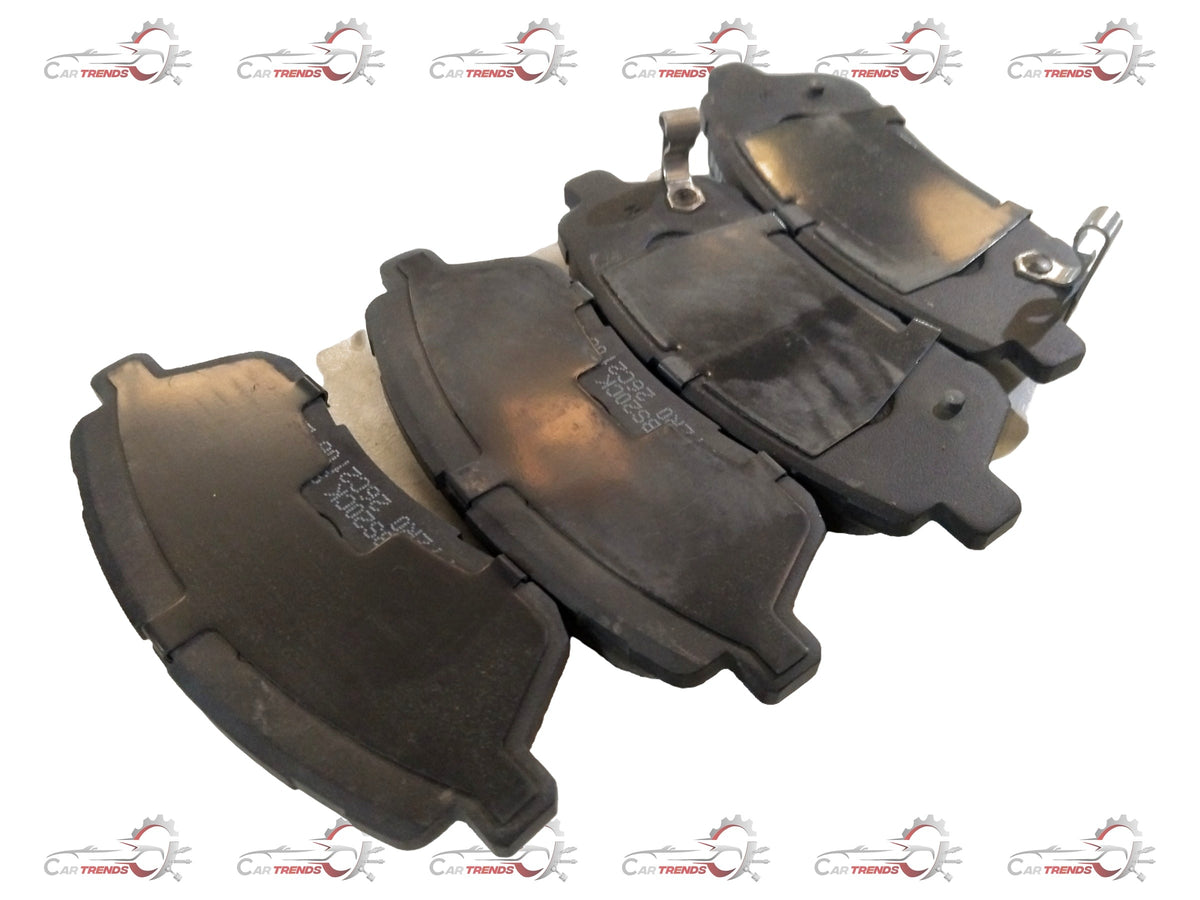 Front brake pad for Maruti Suzuki Baleno, showing the new Maruti Suzuki brake pad with metal backing and friction surface.