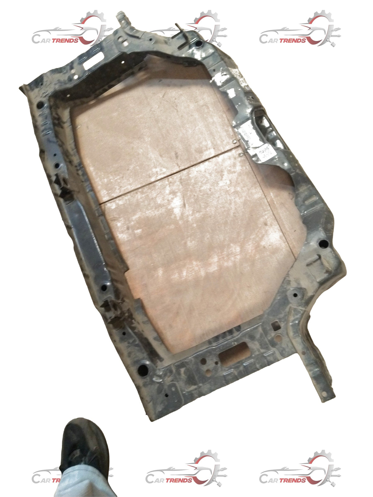 CarTrends EON carrier frame radiator spare part showing a metal radiator frame with mounting brackets and connecting points.