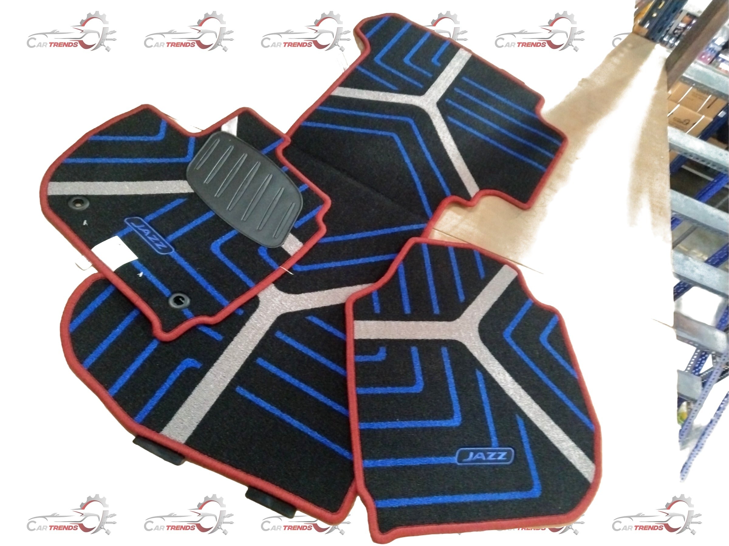 Red Honda floor mat for City, Amaze, Elevate, WR-V models, featuring durable rubber surface with Honda branding.