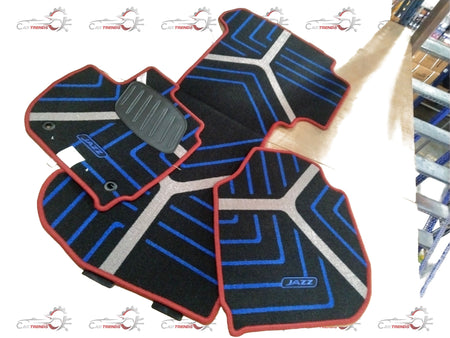 Red Honda floor mat for City, Amaze, Elevate, WR-V models, featuring durable rubber surface with Honda branding.
