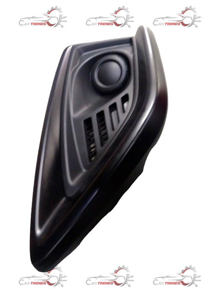 Front fog lamp bezel for Maruti Suzuki vehicle, left side, close-up view of the black plastic trim piece.