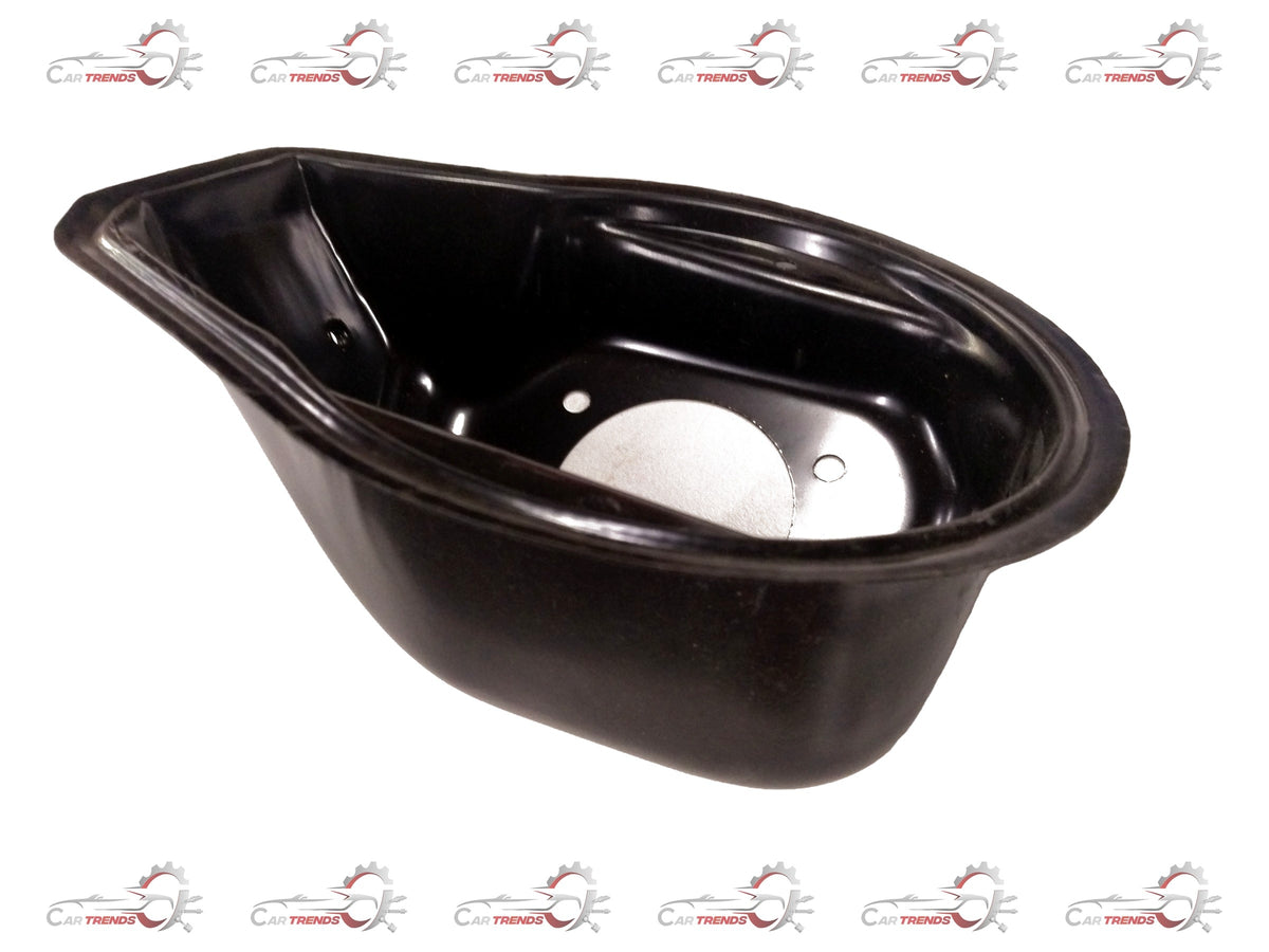 General Motors Chevrolet Spark fuel filler cap, showing the black plastic cover and surrounding area of the vehicle's fuel port.