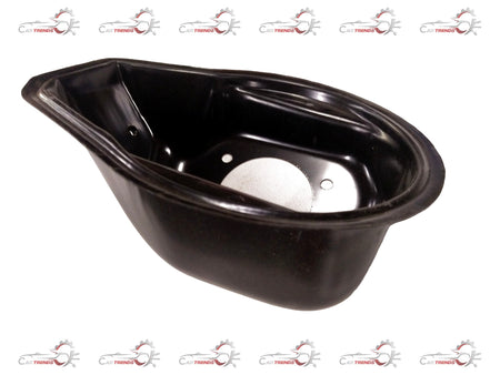 General Motors Chevrolet Spark fuel filler cap, showing the black plastic cover and surrounding area of the vehicle's fuel port.