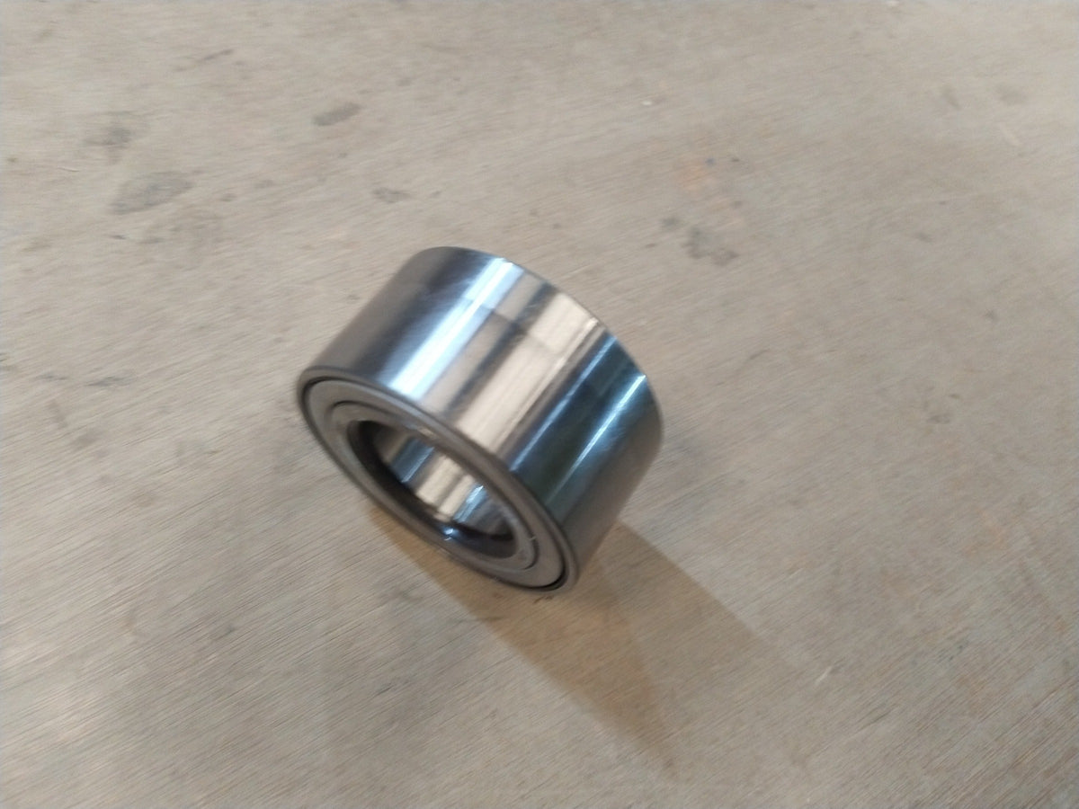 Front wheel bearing for XCENT car by CarTrends, showing the metal bearing part with mounting surface and internal components.