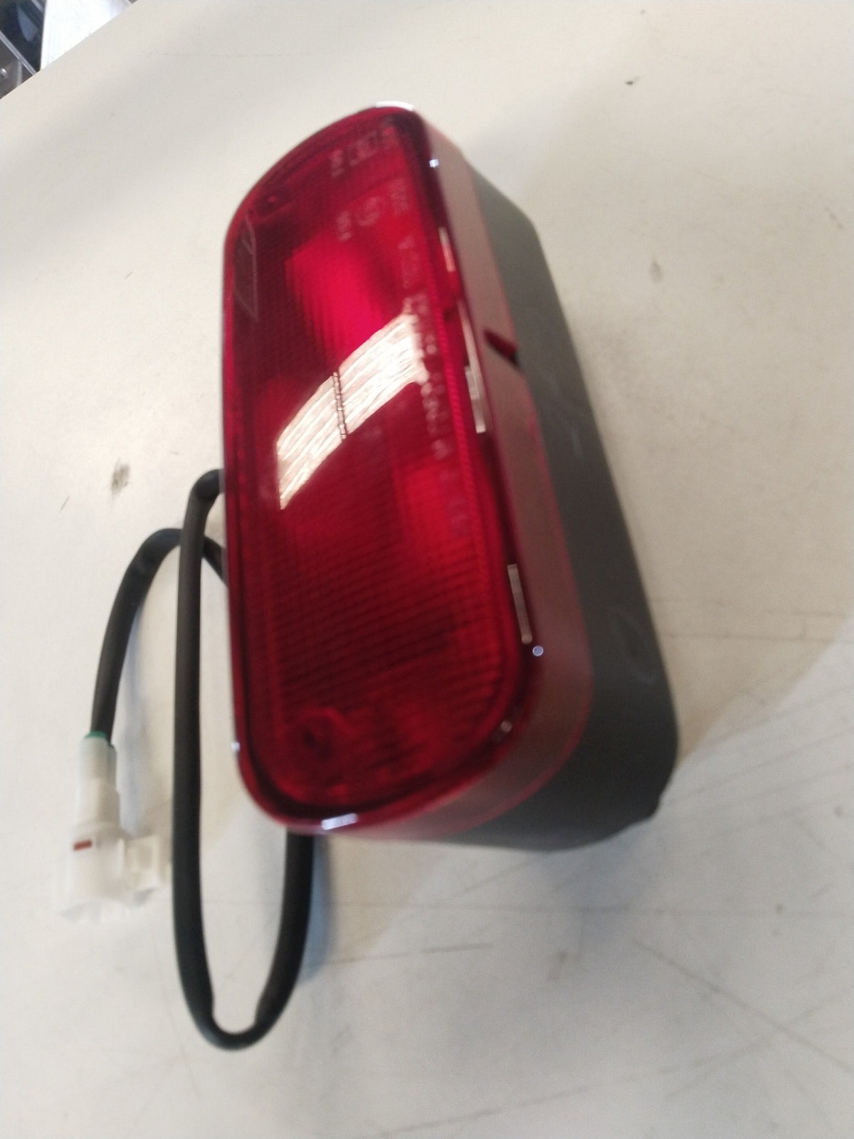 CarTrends fog lamp assembly for Maruti Suzuki Swift, showing the clear plastic lens and mounting brackets in a close-up image.