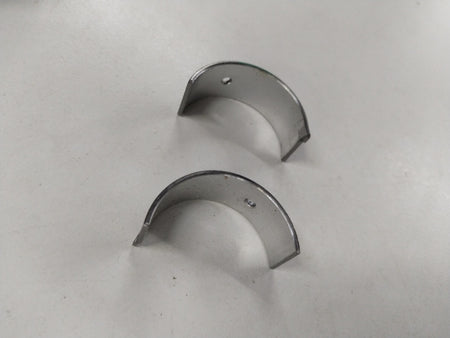 Chevrolet Aveo bearing connecting rod, general motors part, showing the metal component with detailed surface texture.