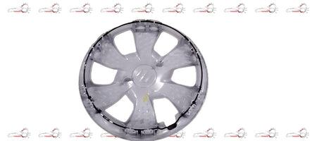 Maruti Suzuki 13-inch wheel cover with stylish design, shown on a vehicle wheel in a close-up view.