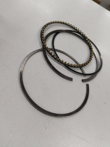 Chevrolet Corsa piston ring kit 1.6L standard by General Motors, showing piston rings and components for engine repair.