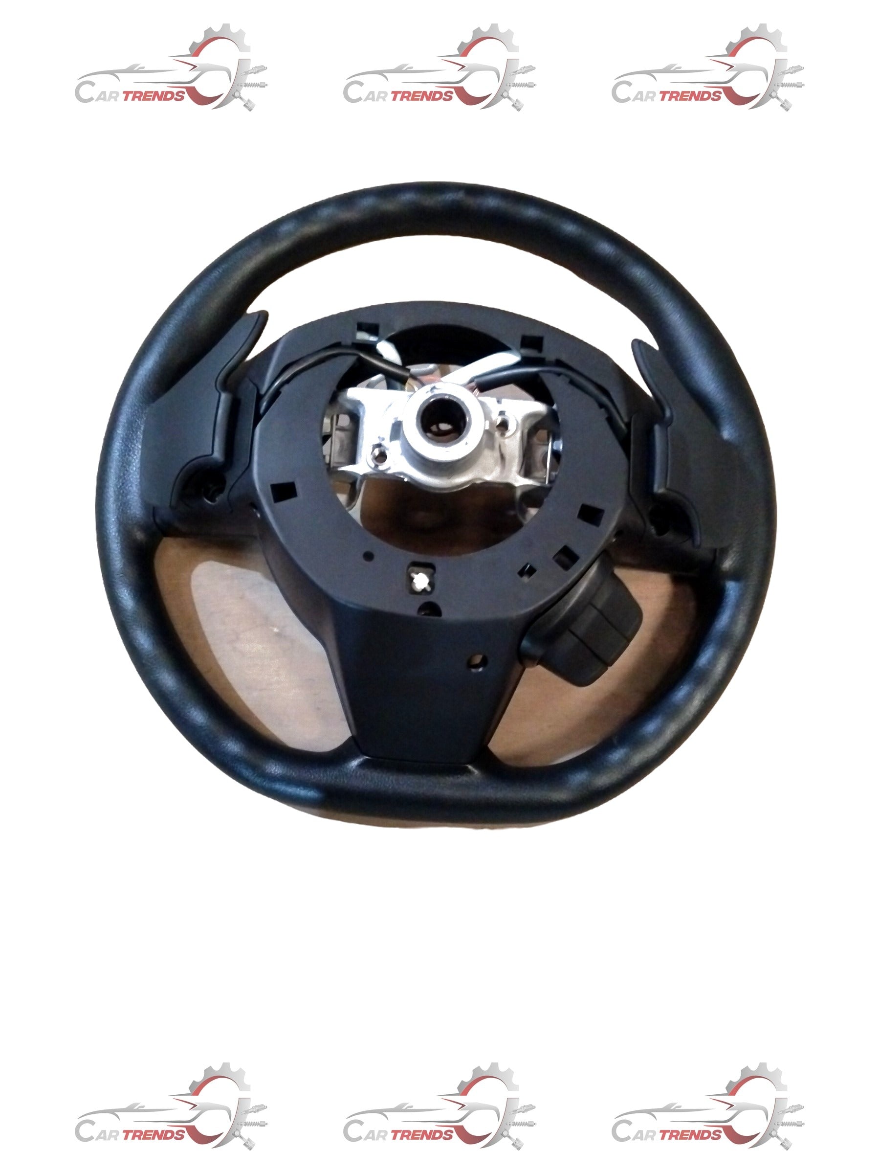 Maruti Suzuki XL6/Brezza base model steering wheel with black finish and integrated control buttons, designed for Maruti Suzuki vehicles.