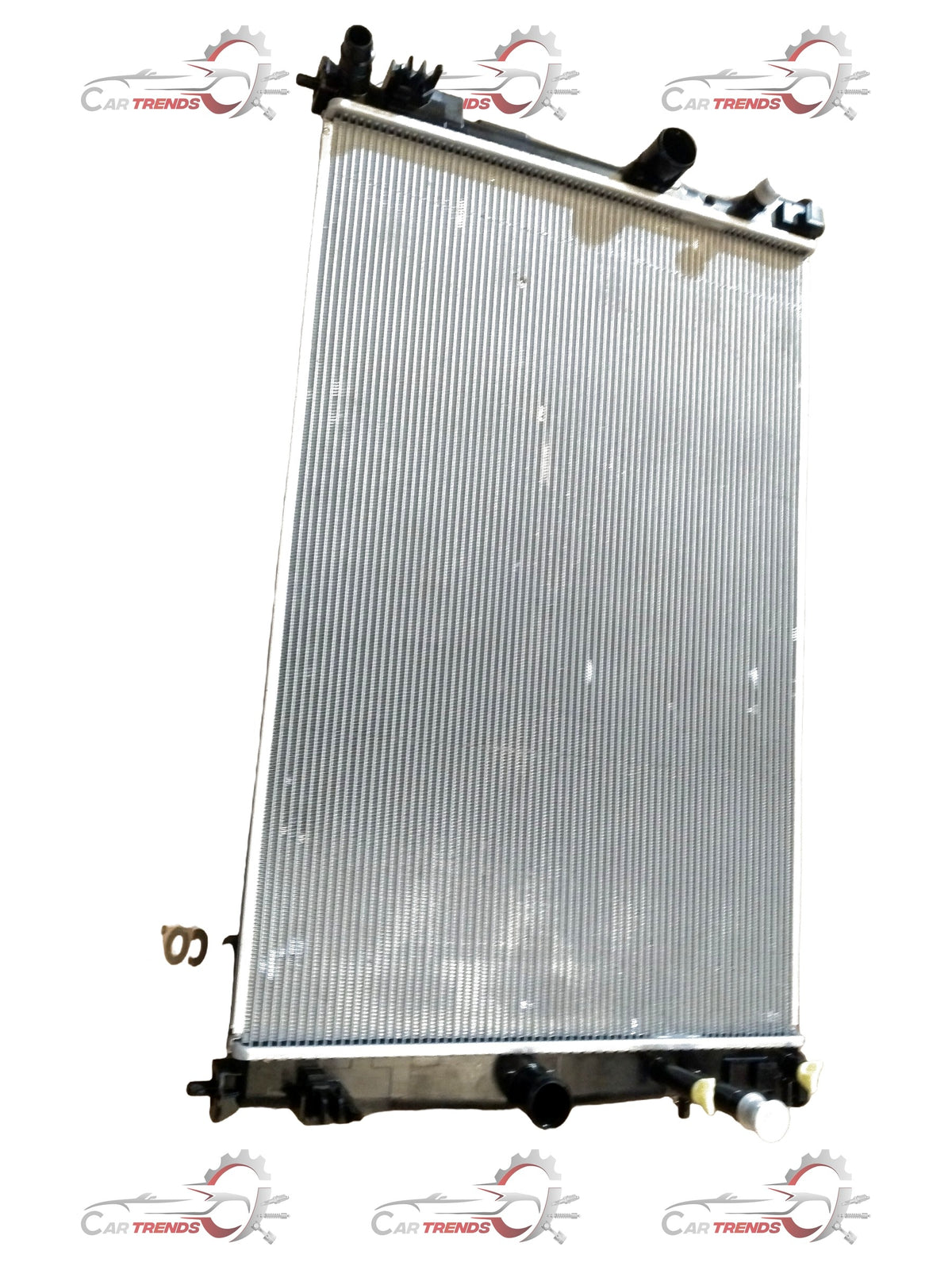 Toyota Invicto radiator assembly by CarTrends, showing the metal radiator core and mounting brackets in a clear view.