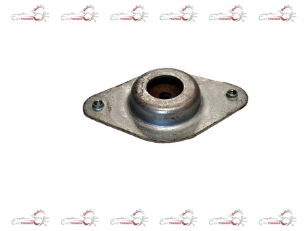 Front suspension strut for Nissan Renault vehicle, showing the metal coil spring and shock absorber assembly.