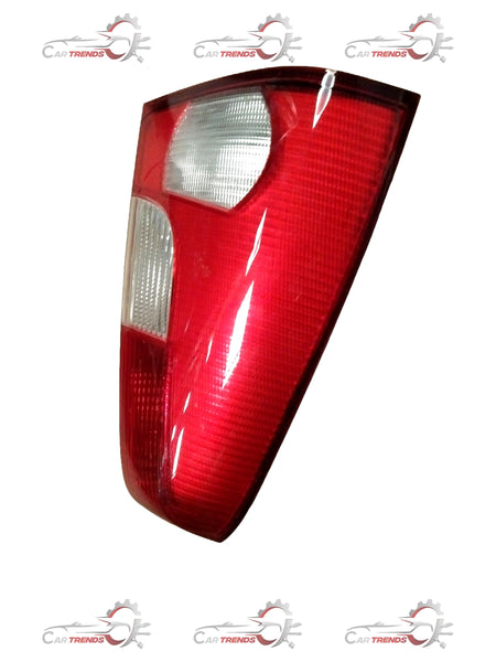 Mahindra Verito rear left lens light assembly showing the lens and housing for vehicle's rear left side.