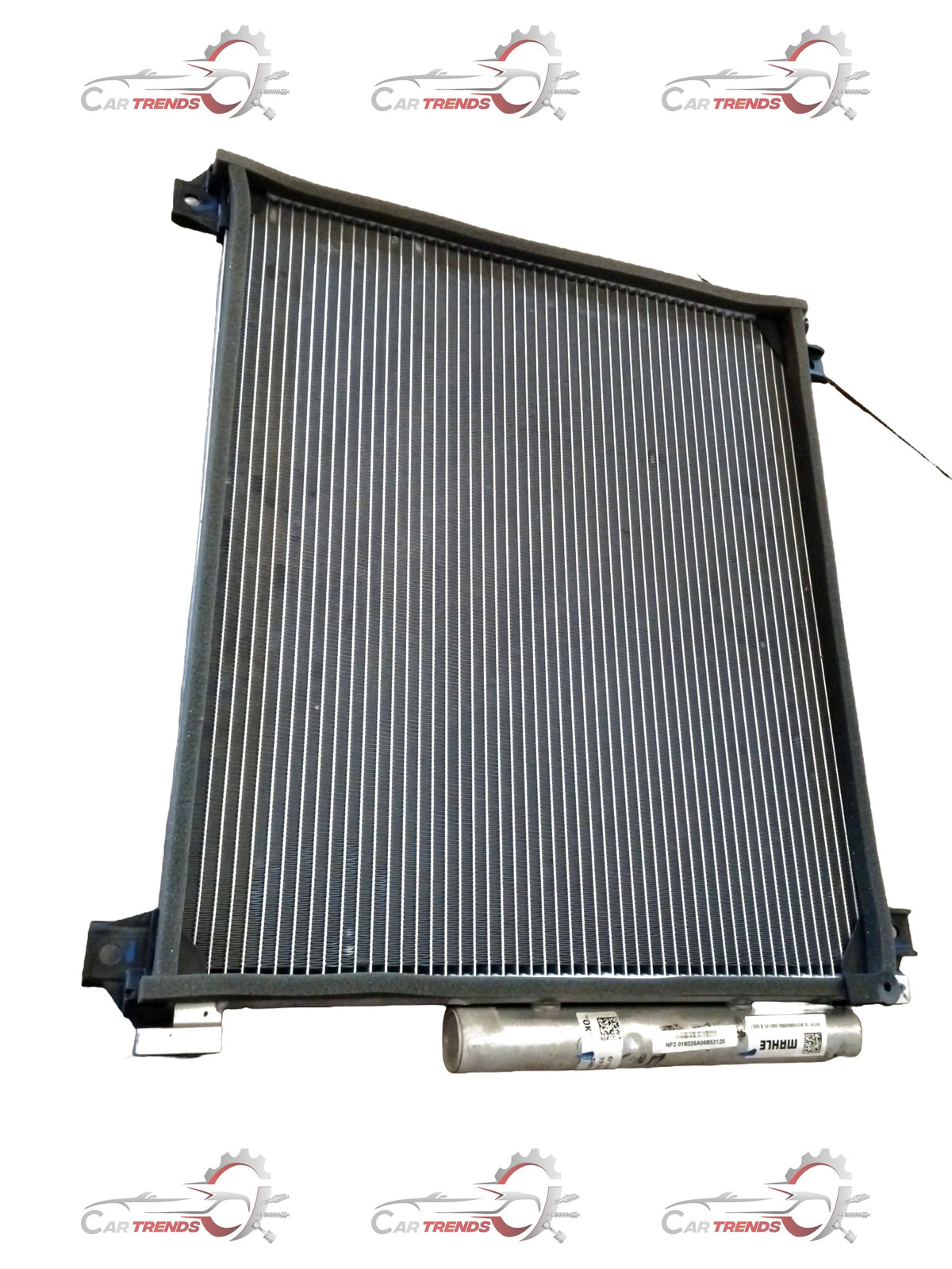 Maruti CarTrends AC condenser for WagonR 3rd gen and Celerio 2nd gen petrol/CNG models, showing the metal core and fittings