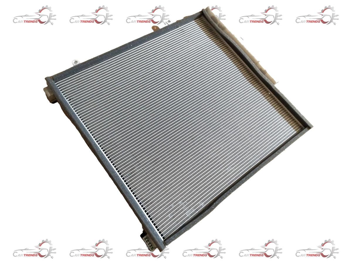 CarTrends AC condenser for Brezza 2nd Gen (2022+) petrol and CNG models, showing the metal core and fins in a close-up image.