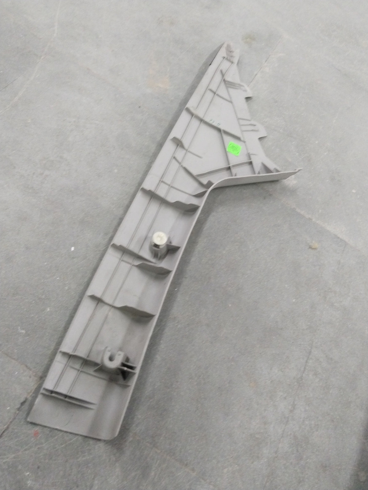Chevrolet Beat right-hand molding assembly garnish by General Motors, showing the sleek exterior trim component.