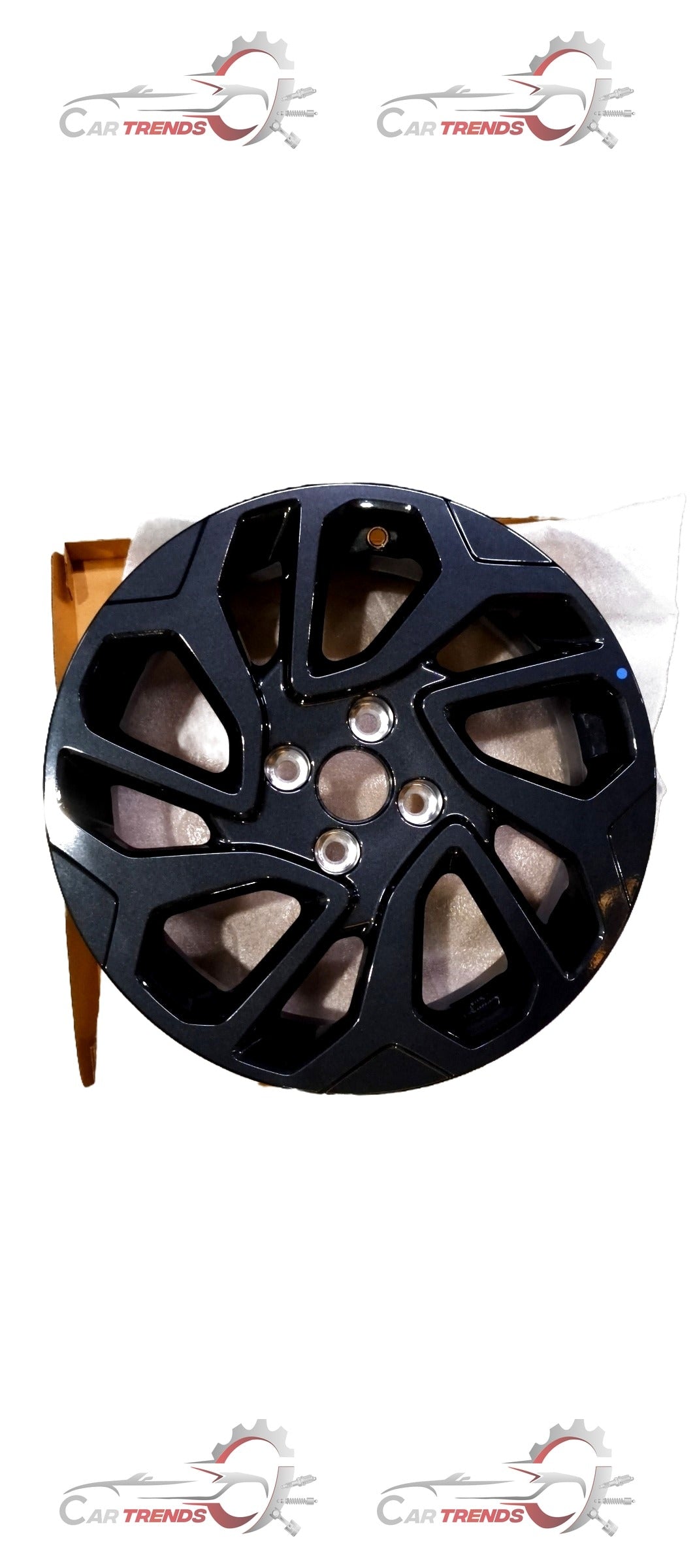 Maruti Suzuki alloy wheel for Fronx, featuring a sleek silver design with multiple spokes, detailed close-up view.