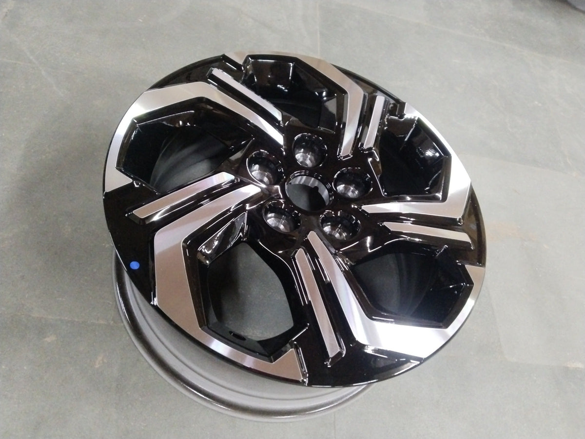 16-inch CarTrends alloy wheel for Maruti Brezza 2022+ in finish 0CE, showing a close-up of the silver alloy rim.