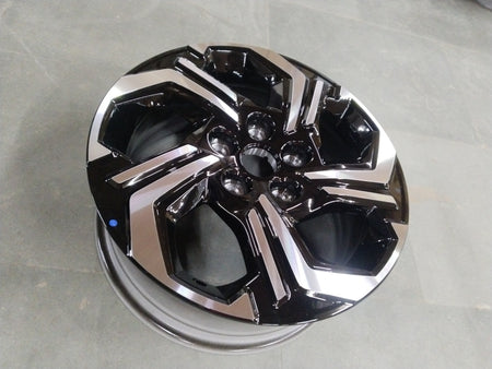 16-inch CarTrends alloy wheel for Maruti Brezza 2022+ in finish 0CE, showing a close-up of the silver alloy rim.