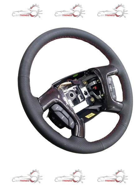 Steering wheel for Chevrolet Enjoy by General Motors, showing the black interior component with textured grip surface.