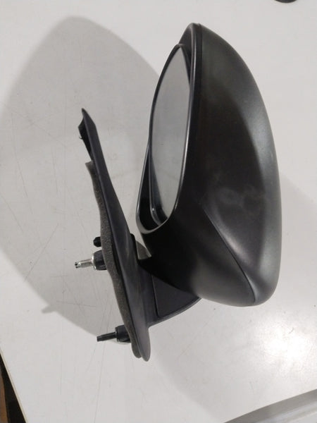 Left side mirror for Maruti Suzuki Swift and Dzire, model #84702M56R005PK, showing the mirror housing and reflective surface.