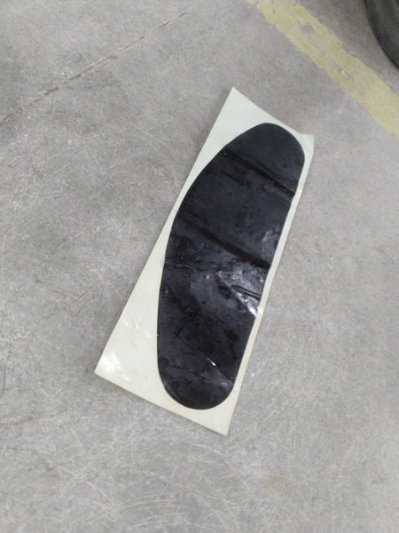 Blank Chevrolet Corsa sticker from General Motors, shown in a close-up image with the sticker's surface and edges visible.