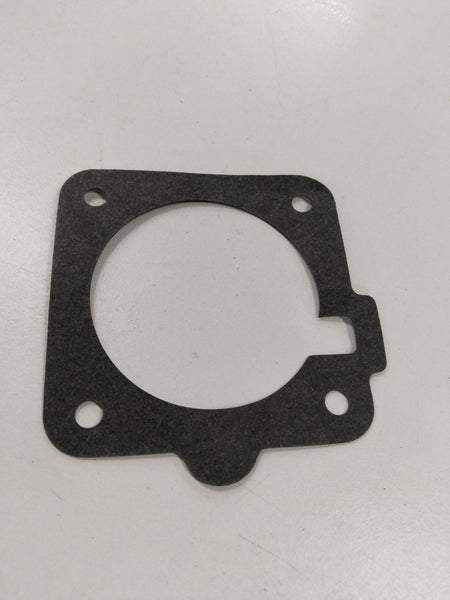 General Motors fuel injector gasket and meter body for Chevrolet Corsa, showing the detailed gasket and fuel meter components.