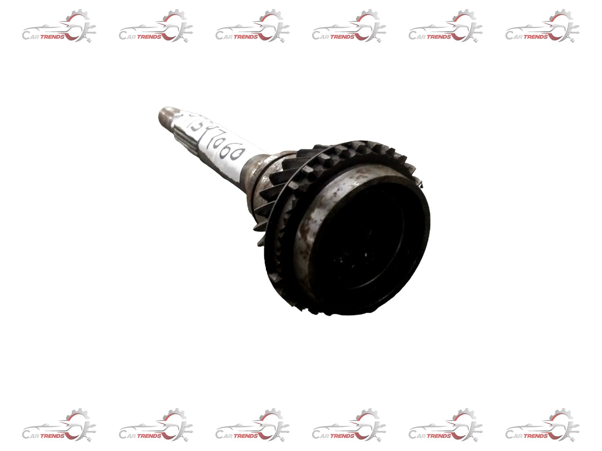 Two images of a Chevrolet Tavera shaft top gear transmission part from General Motors, showing different angles of the component.