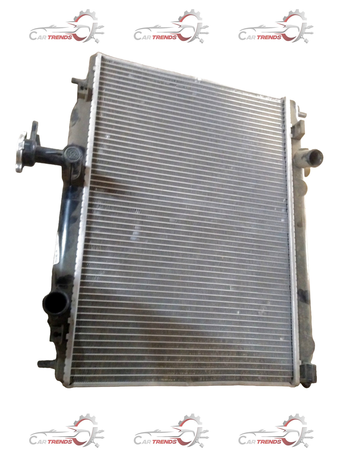 CarTrends Verna old model radiator assembly, petrol spare part with metal fins and mounting brackets, for car cooling system.