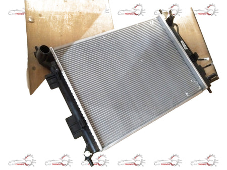 Hyundai Grand i10/Xcent 2013-2019 petrol radiator assembly, front view showing core and mounting points.